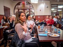 Woman talking in audience